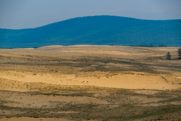 istock View of a sandy plateau surrounded by forest and mountains 2185005855
