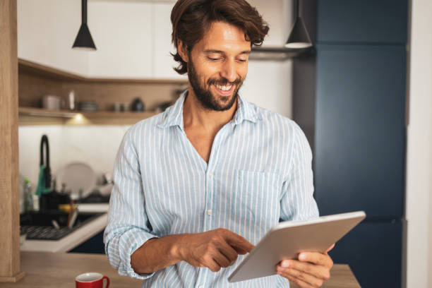istock Portrait of a man using digital tablet 2185006065