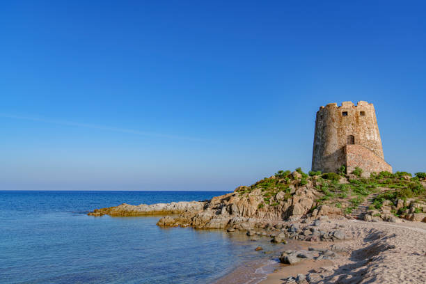 istock A beautiful seaside with an old brick tower in the foreground 2185009964