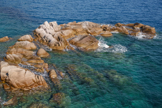 Rocky seaside with beautiful water color and amazing rock colors