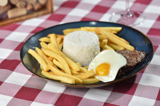 istock rice with fries meat and poached boiled egg lunch meal 2185010152