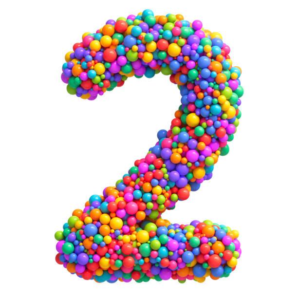 istock Number 2 made of bright multi-colored glossy balls. Digit two. Ideal for kid's zone, playroom decor, children’s design, festive themes. Rainbow mixed random spheres formed creative font. 3d rendering 2185010404