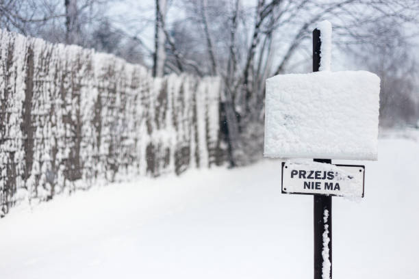 istock Snow-Covered Sign on Winter Street 2185013639