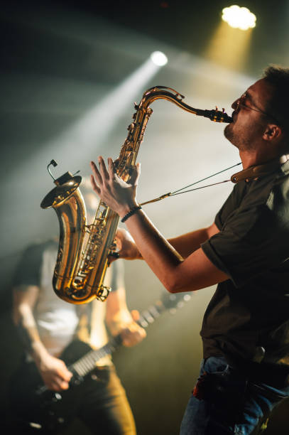 istock Saxophonist performing live on stage with passion and skill 2185015784