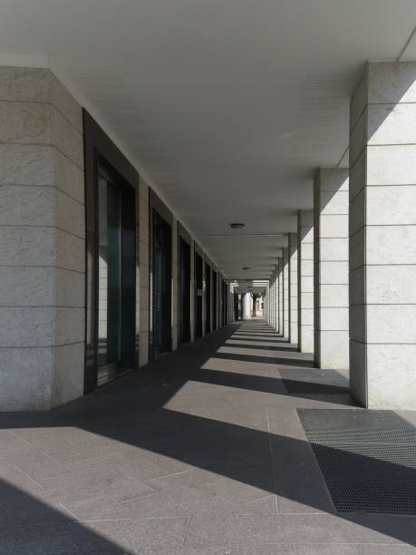 istock Portico with sidewalk and square pillars 2185016034