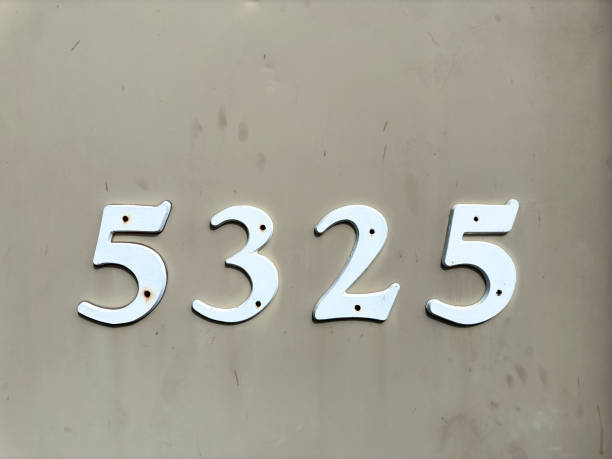istock Residential building number on house exterior wall 2185019269