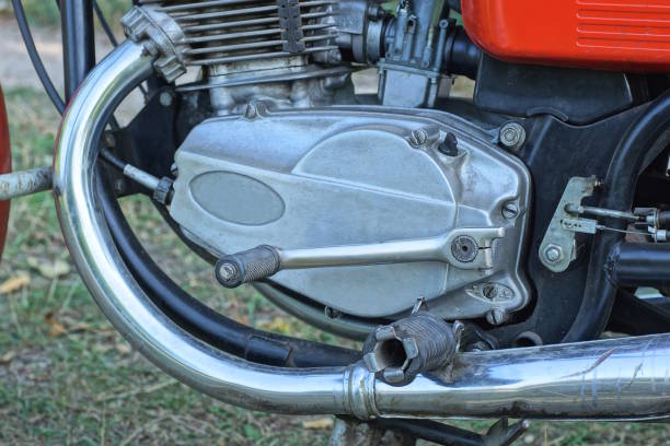 istock part of old motorcycle with gray iron radiator and engine 2185019514