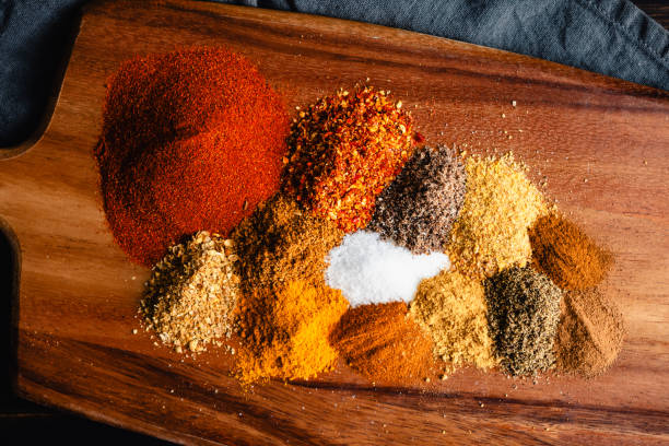 Berbere Spice Blend Ingredients on Cutting Board Close-up