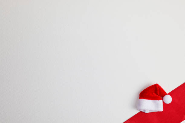 istock Santa Claus hat on white background with copy space for your text. 2185040083