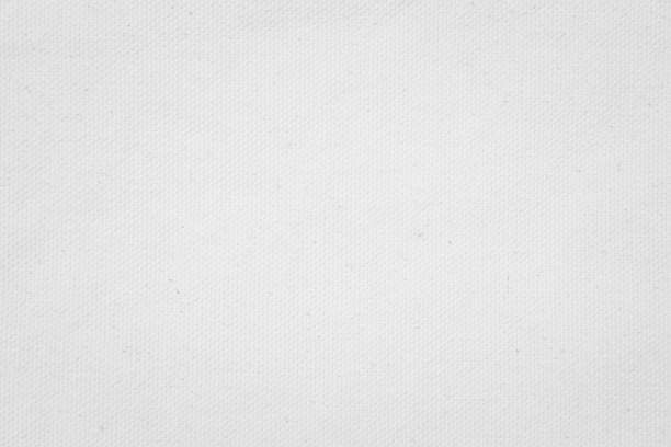istock Jute hessian sackcloth woven texture pattern background in light white color textile. White canvas fabric, linen cotton cloth rough texture background of watercolour paper craft blank cardboard empty. 2185040998
