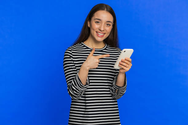 istock Woman use smartphone typing new post on web message browsing addiction of social networks play game 2185041812