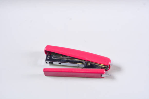 Staples Stapler small blue isolated on white background.
