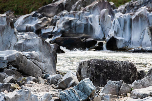 Gole Alcantara botanical and geological park, mountain river with geological rocks formations, Sicily, Italy