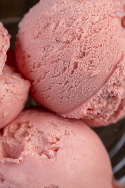 istock red strawberry-flavored ice cream in a glass bowl 2185053172