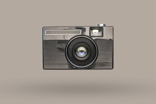 istock Vintage Compact Camera on Neutral Background: Retro Photography Concept 2185054356