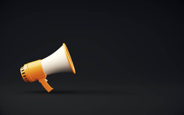 istock Yellow Electric Megaphone on Black background. 2185054542