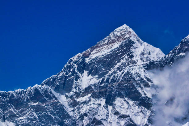 Ama dablam mountain peak and Chola or Cholatse lake. View from Dzongla village.Everest base camp trek detour route and visible peaks concept.Sagarmatha national park