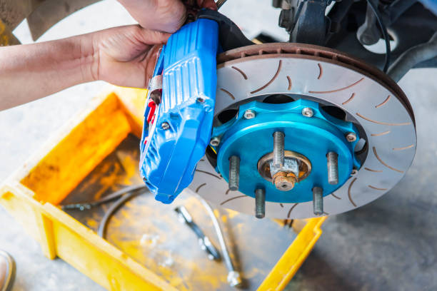 istock Checking car brake system for repair at car garage 2185056980