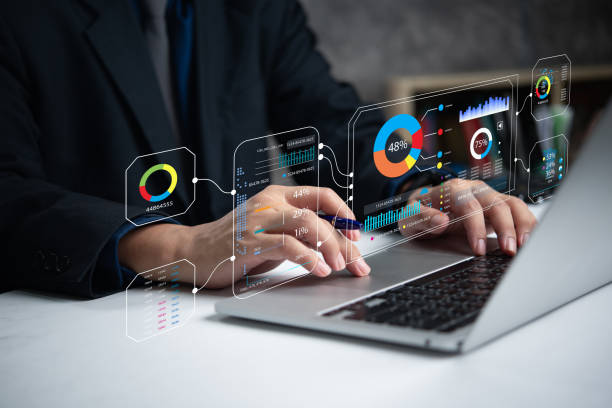 istock A person operates a laptop displaying digital analytics charts and graphs. 2185057836