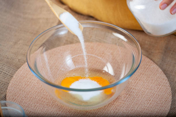 Mixing flour and eggs, making lemon cake