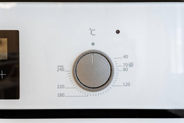 istock A detailed image of a modern ovens temperature control knob is ideal for enhancing efficiency in household baking and cooking in the kitchen, catering to culinary enthusiasts 2185068825
