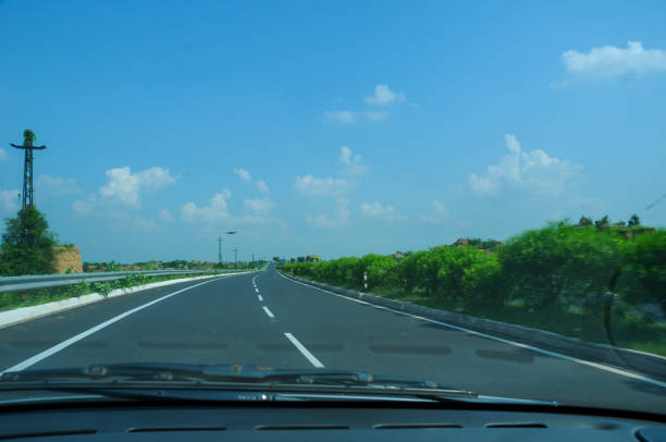 A scenic view of the Agra-Gwalior Road, highlighting the beautiful landscape of the region.