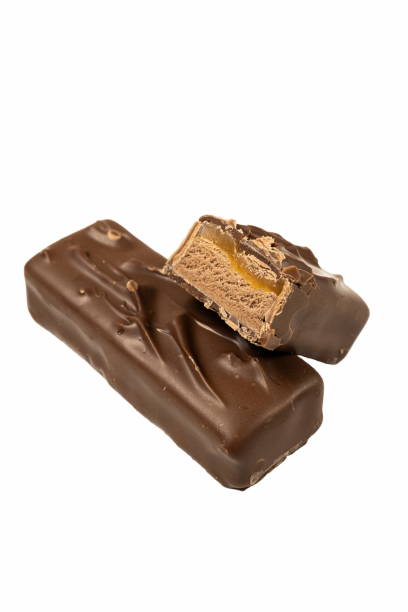 istock This chocolate bar features a rich chocolate coating with a luscious caramel filling, perfect for satisfying a sweet tooth or enjoying as a treat 2185076340