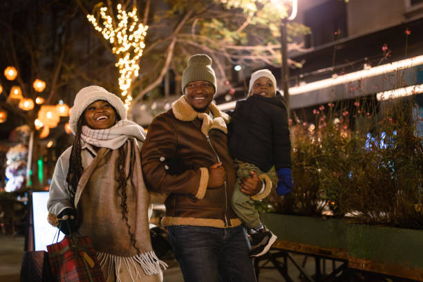 istock Family Enjoying Winter Evening Stroll 2185079276