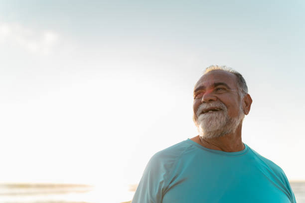 istock Senior man contemplating on the beach 2185082738