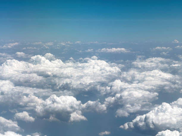istock Blue sky over clouds, View out of an airplane window. 2185109056