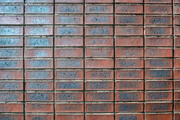 Brick wall background texture. Red brown color tiles Building facade material detail
