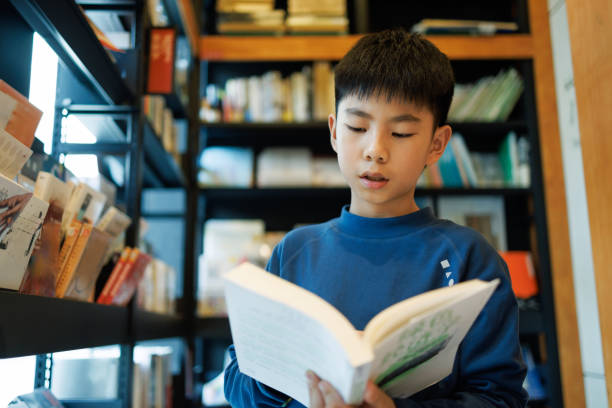 istock A china primary school student is reading in a bookstore 2185110283