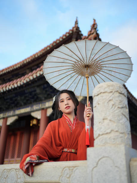 Tourists experiencing the costumes of China's Warring States Period