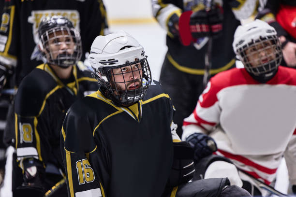 istock Ice hockey, team talk and training with learning strategy, game plan and formation on ice rink, teamwork and collaboration. Men hockey group on sports arena on break after training, exercise or sport 2185119333