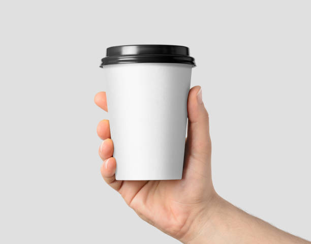 istock Blank paper white coffee cup with black lid mockup isolated on white background .3d rendering, 3D illustration 2185120562