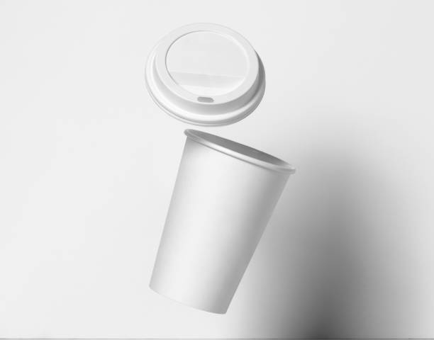 istock Blank paper white coffee cup with black lid mockup isolated on white background .3d rendering, 3D illustration 2185120567