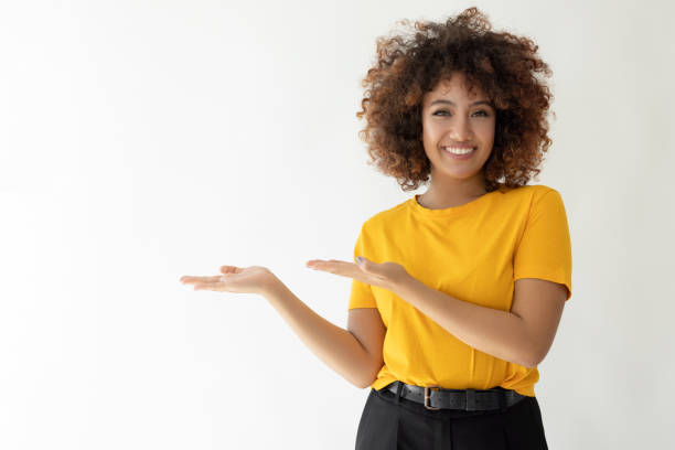 Young woman smiling with her hands showing