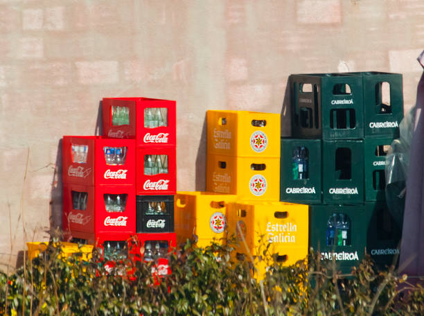 istock Heap of multicolored plastic crates outside a bar. 2185123629
