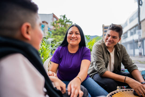 istock Parents talking to son at coffee shop 2185124134