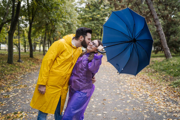 istock Couple in love on a rainy day 2185124232
