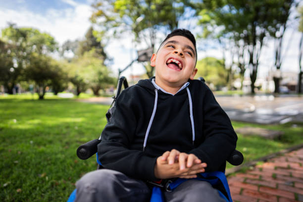 istock Happy child boy with physical disability outdoors 2185124262