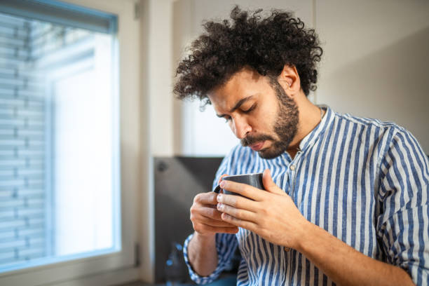 istock Middle Eastern Man Relishing Coffee at Home 2185124955