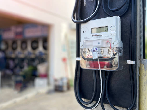 istock A digital electricity meter on a pole in front of a building is an electronic energy measurement device. It is designed to automatically record water and electricity usage. 2185127527