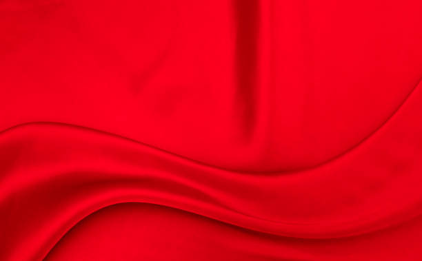 istock Black red satin dark fabric texture luxurious shiny that is abstract silk cloth background with patterns soft waves blur beautiful. 2185131966