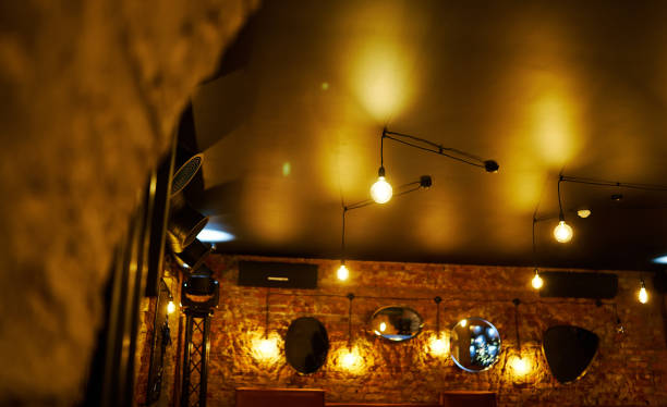 istock Cozy interior of a rustic cafe with warm lighting and unique decor during evening hours concept 2185135871