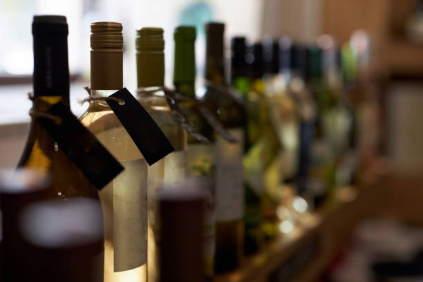 istock White Wine in Transparent Glass Bottles 2185139481
