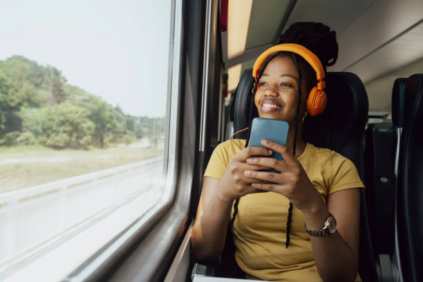 istock Young woman traveling by train 2185143672