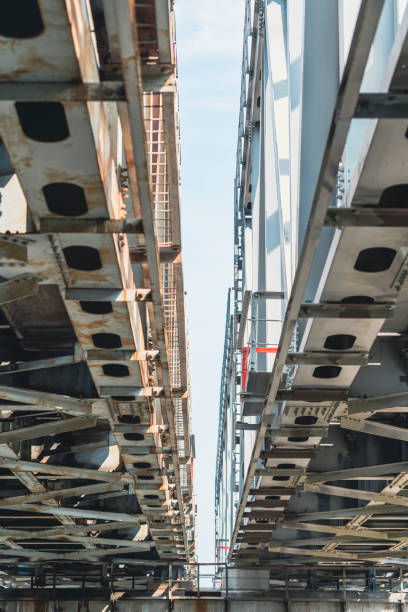 istock Close-up view of metal bridge structure from below 2185147427
