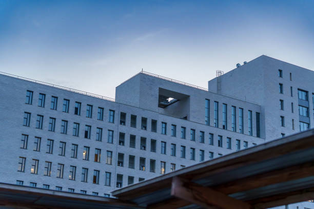 istock Modern office building exterior during twilight with geometric design 2185147605