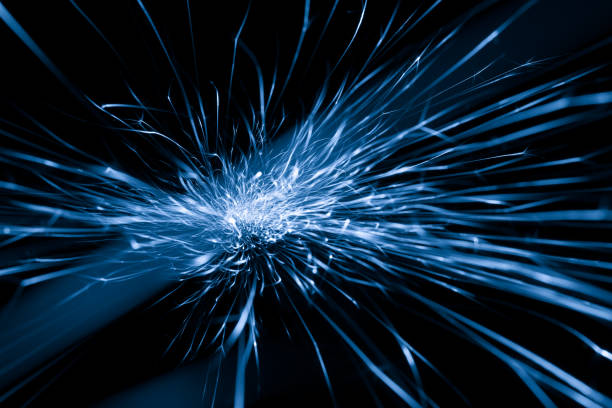 istock blue sparks from the grinder glowing in the dark 2185151575
